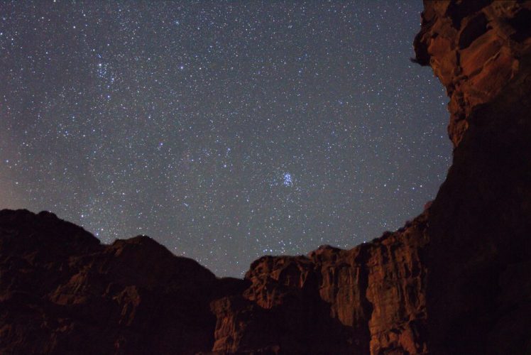 Slow exposure photo of stars in Wadi Rum desert